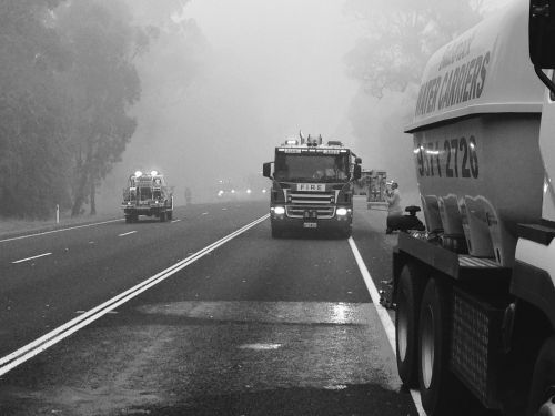 Black and white image of Bullsbrook Water Carriers supplying water to emergency services